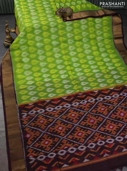Ikat silk cotton saree light green and brown with allover ikat weaves and zari woven border