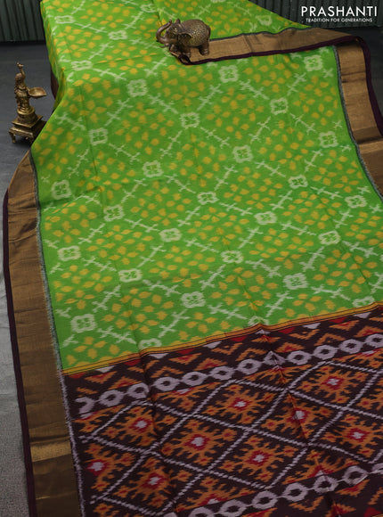 Ikat silk cotton saree light green and deep jamun with allover ikat weaves and zari woven border