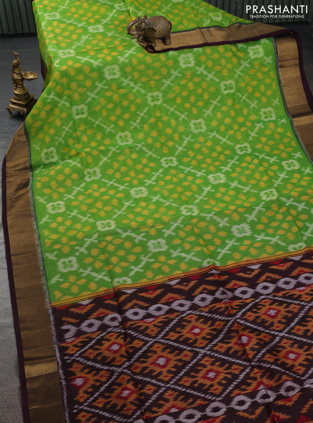 Ikat silk cotton saree light green and deep jamun with allover ikat weaves and zari woven border