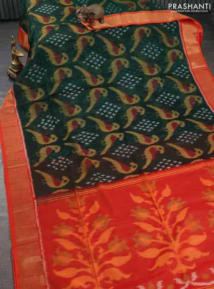 Ikat silk cotton saree green and orange with allover ikat weaves and zari woven border