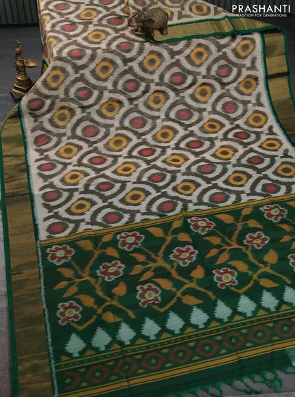 Ikat silk cotton saree cream and green with allover ikat weaves and zari woven border