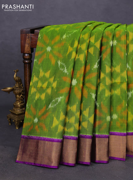 Ikat silk cotton saree light green and violet with allover ikat weaves and zari woven border