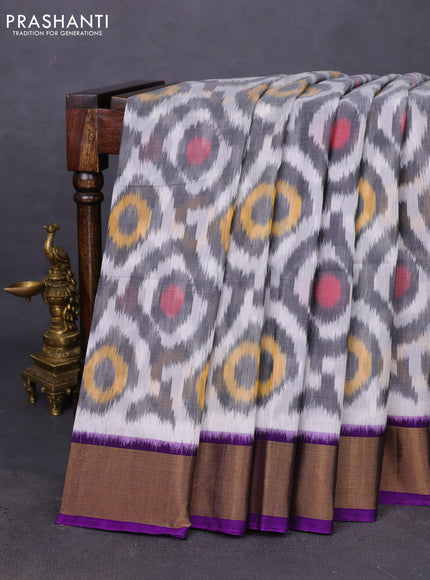 Ikat silk cotton saree off white and violet with allover ikat weaves and zari woven border