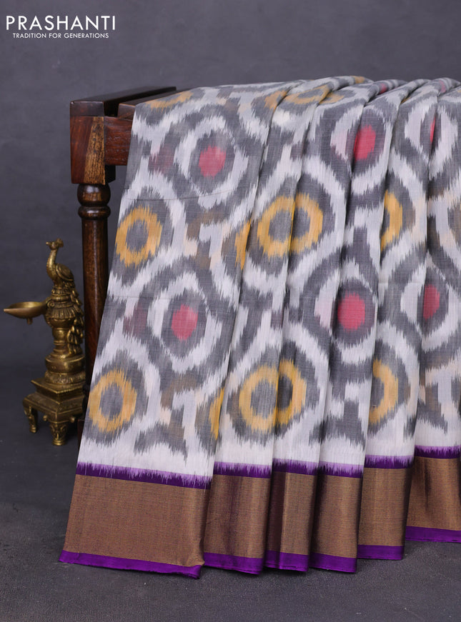 Ikat silk cotton saree off white and violet with allover ikat weaves and zari woven border