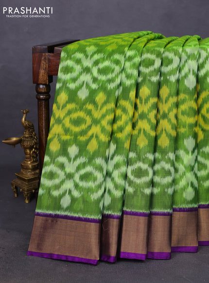 Ikat silk cotton saree light green and violet with allover ikat weaves and zari woven border