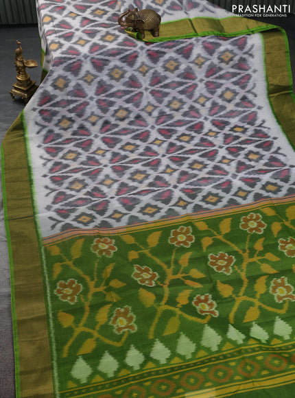 Ikat silk cotton saree off white and light green with allover ikat weaves and zari woven border