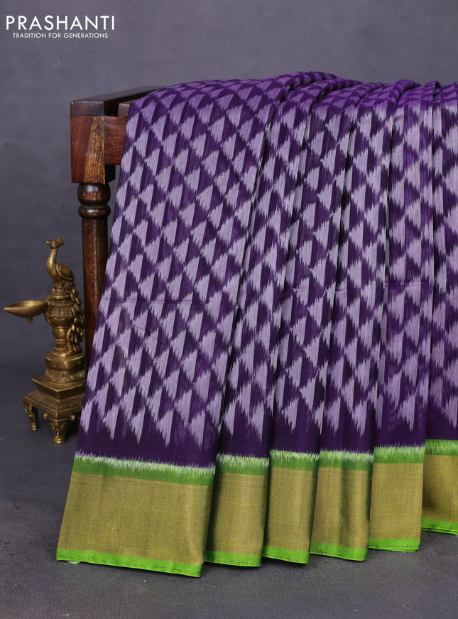 Ikat silk cotton saree navy blue and light green with allover ikat weaves and zari woven border