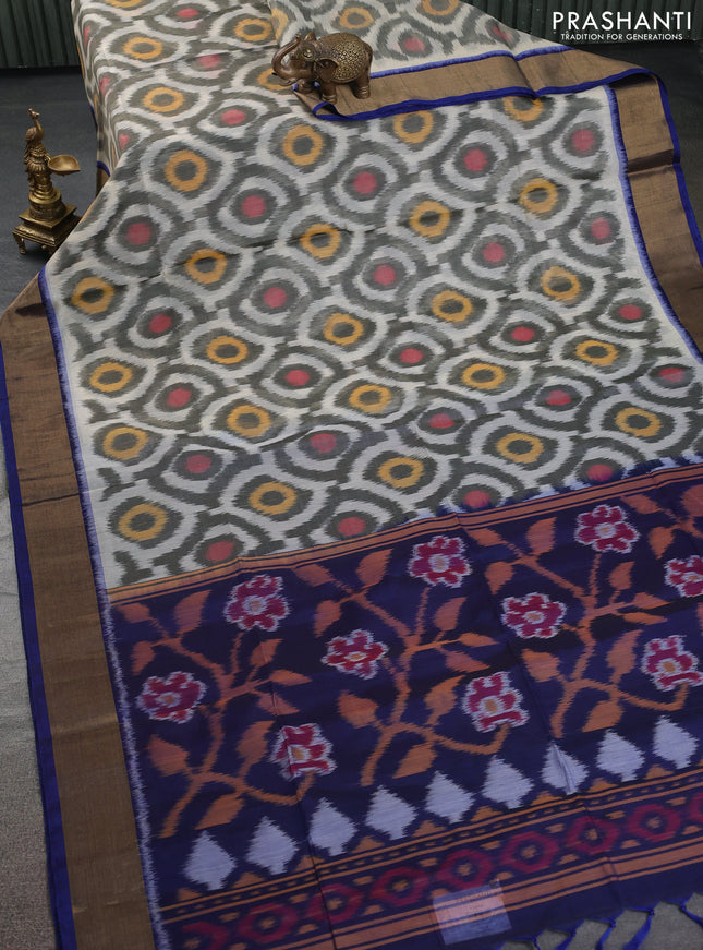 Ikat silk cotton saree grey and blue with allover ikat weaves and zari woven border