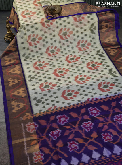 Ikat silk cotton saree mild pista green and blue with allover ikat weaves and ikat woven zari border