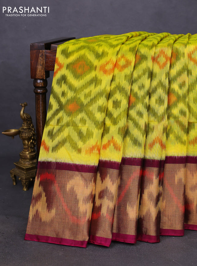 Ikat silk cotton saree lime yellow and dark magenta pink with allover ikat weaves and ikat woven zari border