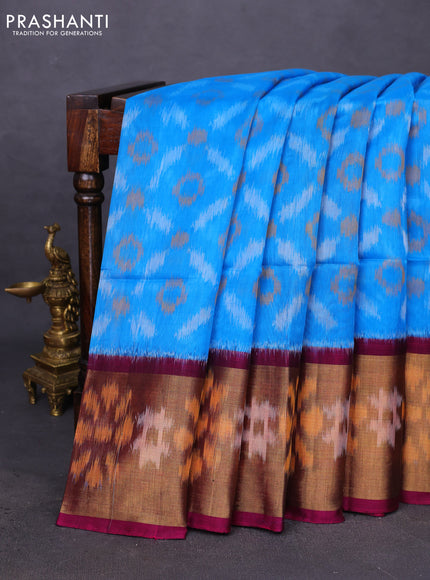Ikat silk cotton saree light blue and dark magenta pink with allover ikat weaves and ikat woven zari border