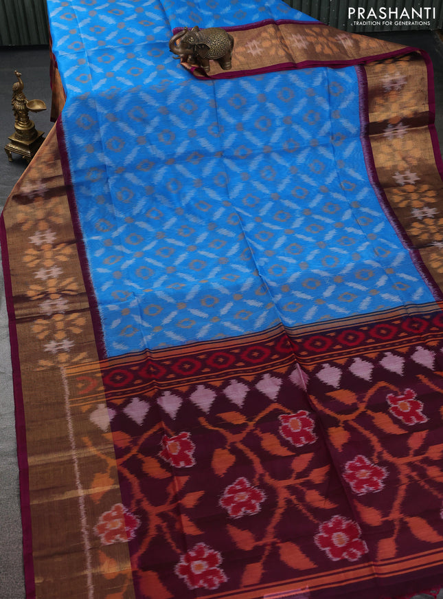 Ikat silk cotton saree light blue and dark magenta pink with allover ikat weaves and ikat woven zari border