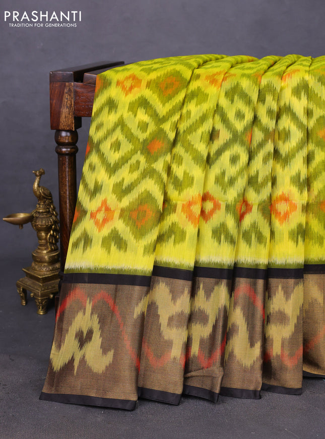 Ikat silk cotton saree lime yellow and black with allover ikat weaves and ikat woven zari border