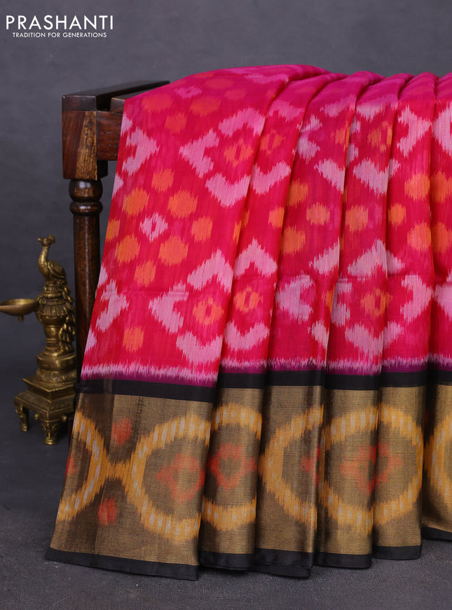 Ikat silk cotton saree pink and black with allover ikat weaves and ikat woven zari border