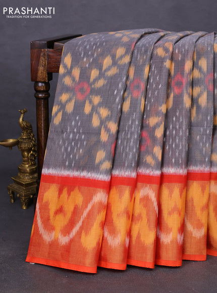 Ikat silk cotton saree grey and orange with allover ikat weaves and ikat woven zari border