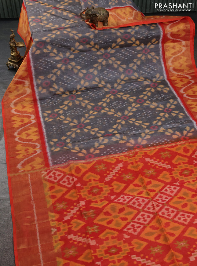 Ikat silk cotton saree grey and orange with allover ikat weaves and ikat woven zari border