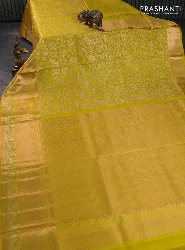 Pure kanchipuram silk saree mustard yellow with allover zari woven brocade weaves and long rich zari woven border