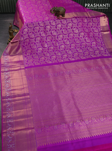 Pure kanchipuram silk saree purple with allover zari woven floral brocade weaves and rich zari woven border