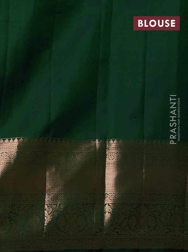 Pure kanchipuram silk saree green with allover silver & gold zari woven brocade weaves and rich zari woven border