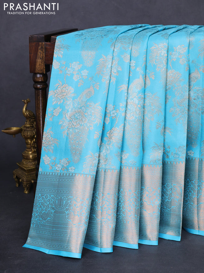 Pure kanchipuram silk saree light blue with allover zari woven peacock brocade weaves and rich zari woven border
