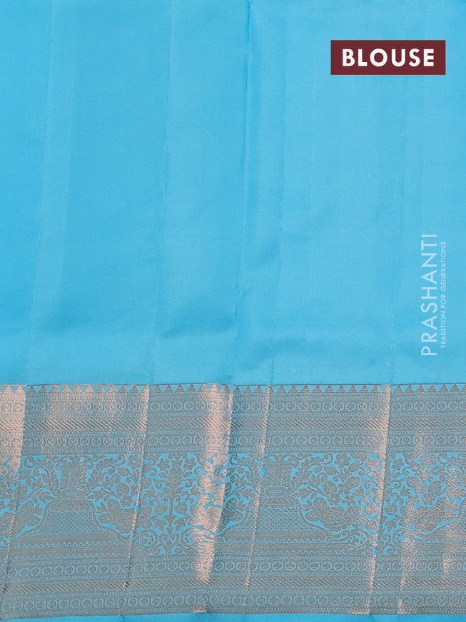 Pure kanchipuram silk saree light blue with allover zari woven peacock brocade weaves and rich zari woven border
