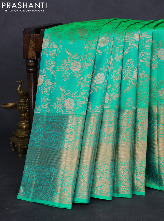 Pure kanchipuram silk saree teal green shade with allover zari woven floral brocade weaves and rich zari woven border