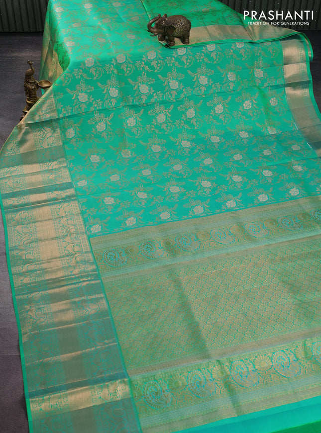 Pure kanchipuram silk saree teal green shade with allover zari woven floral brocade weaves and rich zari woven border