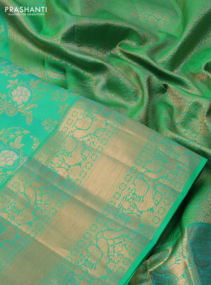 Pure kanchipuram silk saree teal green shade with allover zari woven floral brocade weaves and rich zari woven border