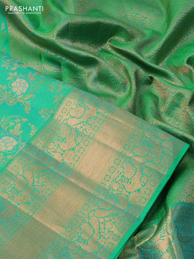 Pure kanchipuram silk saree teal green shade with allover zari woven floral brocade weaves and rich zari woven border