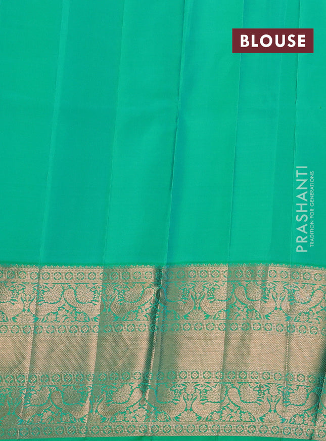Pure kanchipuram silk saree teal green shade with allover zari woven floral brocade weaves and rich zari woven border