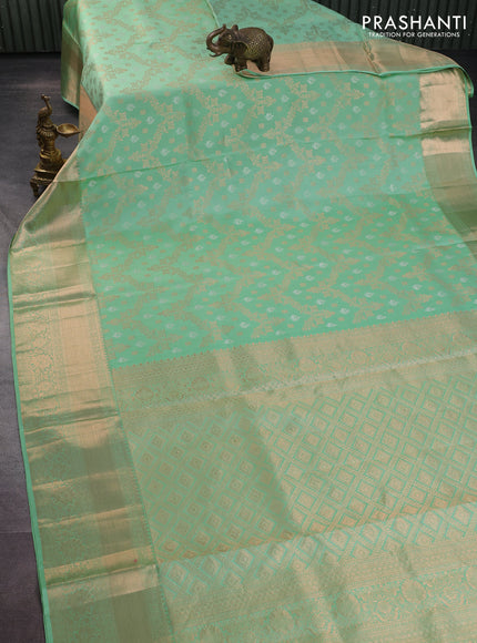 Pure kanchipuram silk saree pastel green with allover zari woven brocade weaves and rich zari woven border