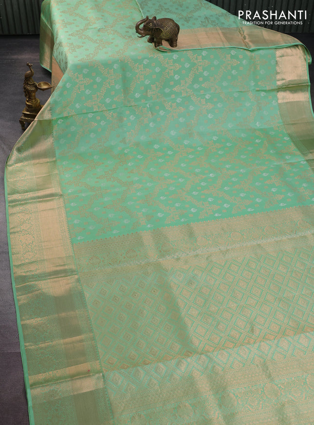 Pure kanchipuram silk saree pastel green with allover zari woven brocade weaves and rich zari woven border