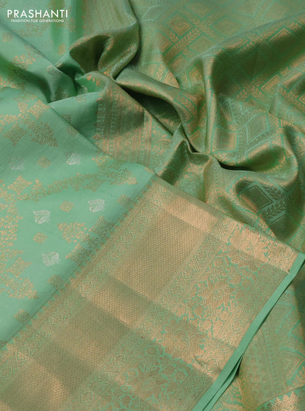 Pure kanchipuram silk saree pastel green with allover zari woven brocade weaves and rich zari woven border