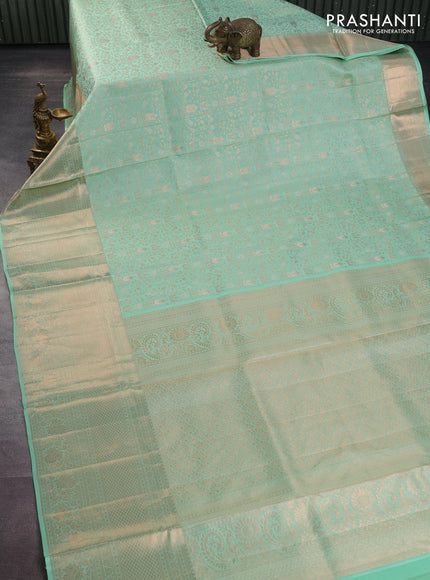 Pure kanchipuram silk saree pastel green with allover zari woven brocade weaves and rich zari woven border