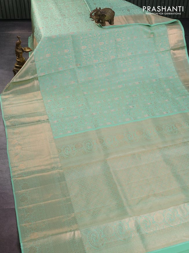 Pure kanchipuram silk saree pastel green with allover zari woven brocade weaves and rich zari woven border