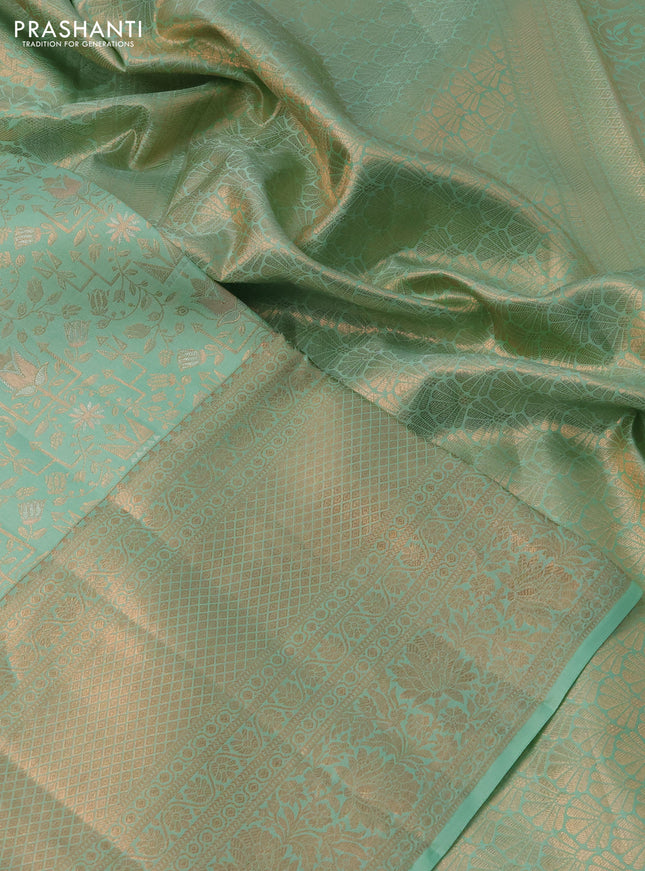 Pure kanchipuram silk saree pastel green with allover zari woven brocade weaves and rich zari woven border