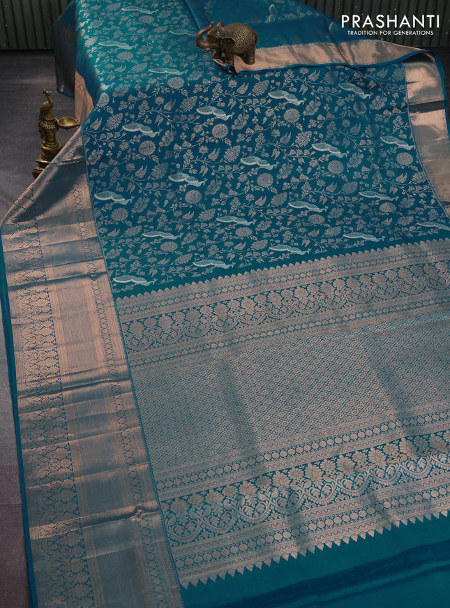 Pure kanchipuram silk saree cs blue with allover zari woven brocade weaves and long rich zari woven border