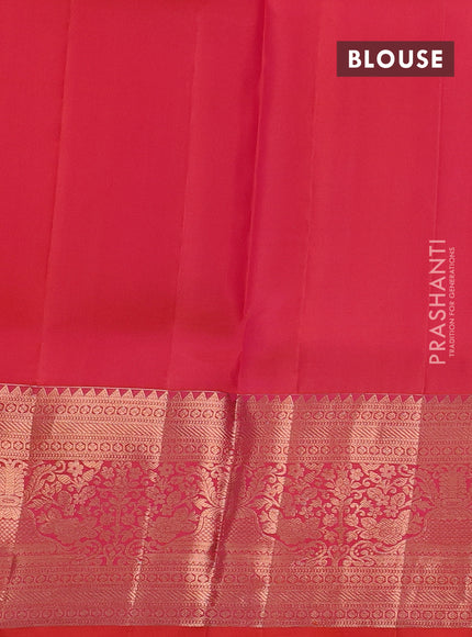 Pure kanchipuram silk saree dual shade of pinkish orange with allover zari woven peacock brocade weaves and rich zari woven border