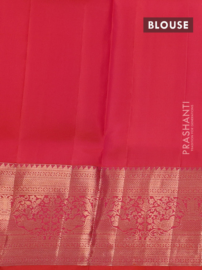 Pure kanchipuram silk saree dual shade of pinkish orange with allover zari woven peacock brocade weaves and rich zari woven border