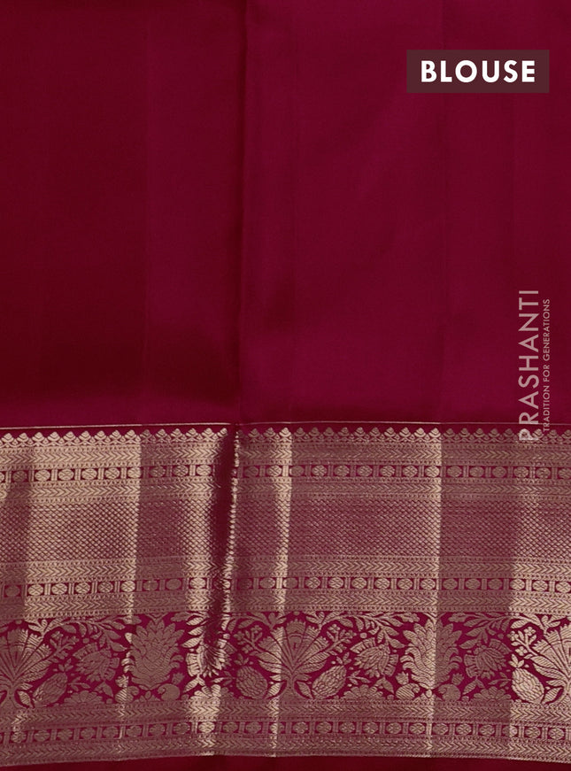 Pure kanchipuram silk saree dual shade of pinkish orange with allover zari woven floral brocade weaves and rich zari woven border