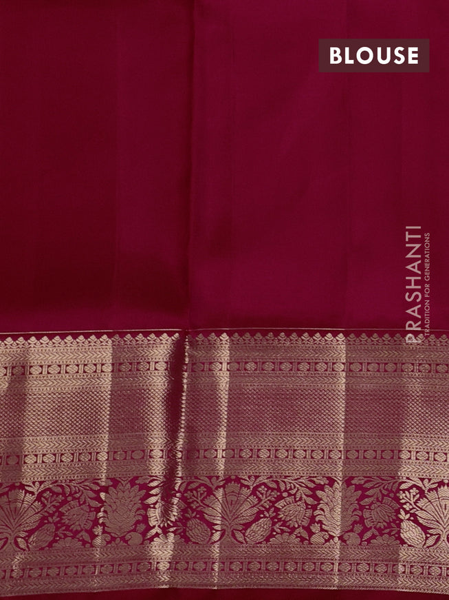 Pure kanchipuram silk saree dual shade of pinkish orange with allover zari woven floral brocade weaves and rich zari woven border