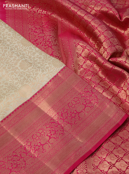 Pure kanchipuram silk saree cream and pink with allover zari woven floral brocade weaves and rich zari woven border