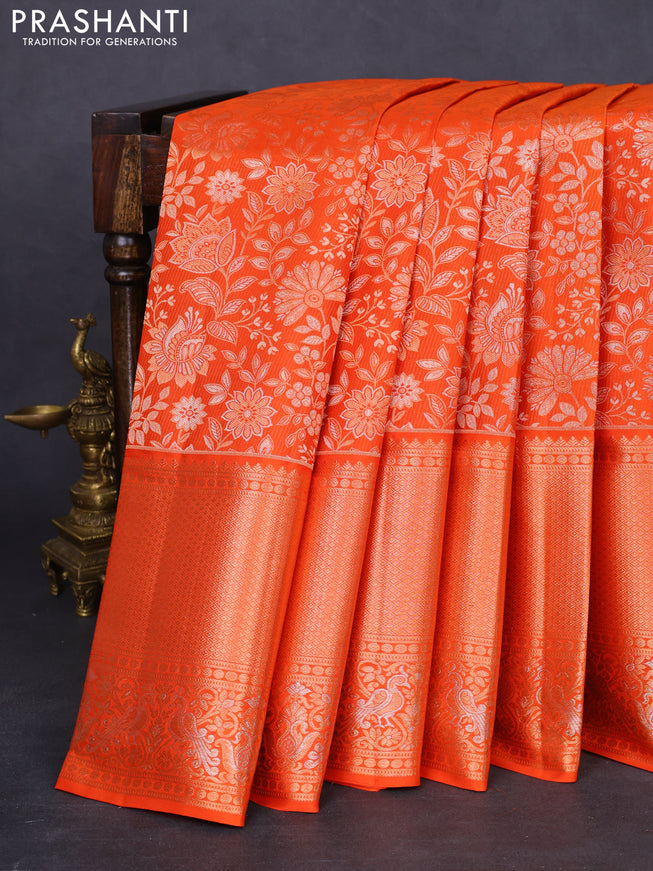 Pure kanchipuram silk saree orange with allover zari woven floral brocade weaves and rich zari woven border