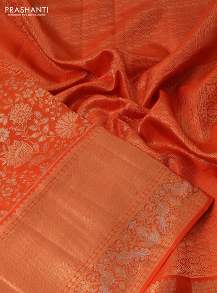Pure kanchipuram silk saree orange with allover zari woven floral brocade weaves and rich zari woven border
