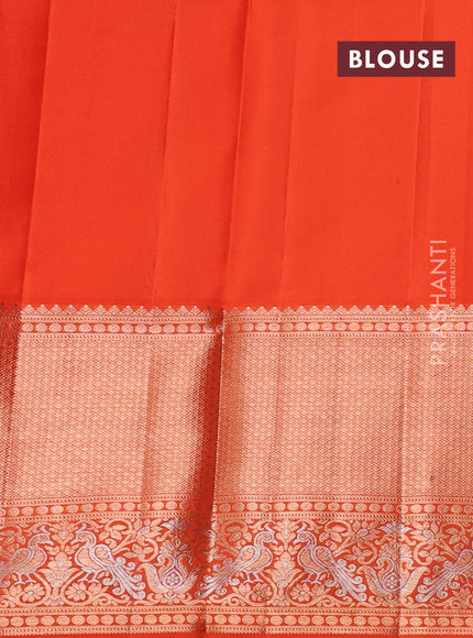 Pure kanchipuram silk saree orange with allover zari woven floral brocade weaves and rich zari woven border