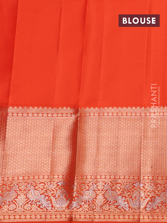 Pure kanchipuram silk saree orange with allover zari woven floral brocade weaves and rich zari woven border