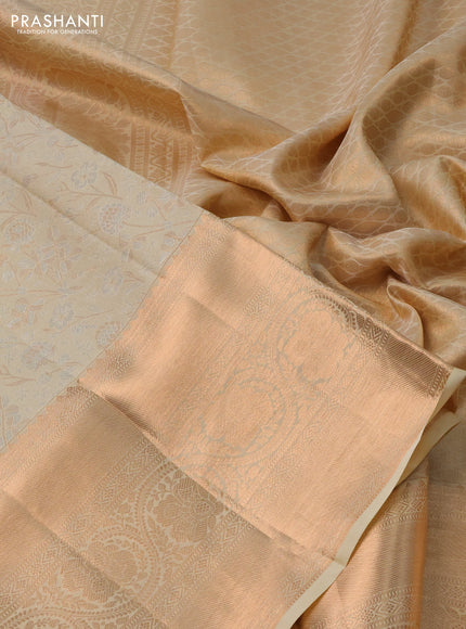 Pure kanchipuram silk saree cream with allover silver & gold zari woven floral brocade weaves and rich copper zari woven border