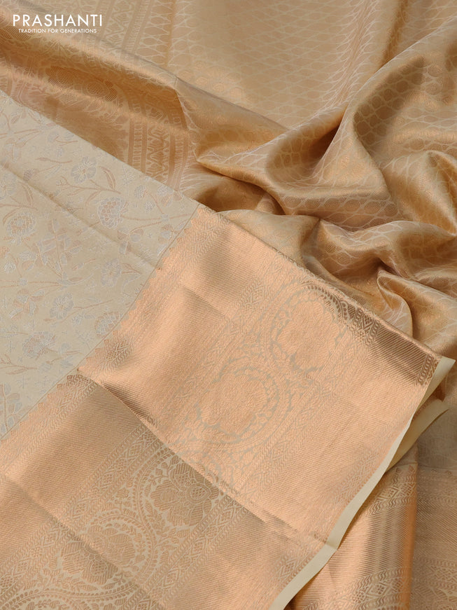 Pure kanchipuram silk saree cream with allover silver & gold zari woven floral brocade weaves and rich copper zari woven border