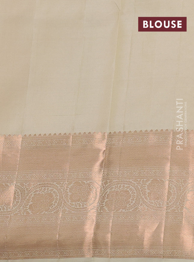 Pure kanchipuram silk saree cream with allover silver & gold zari woven floral brocade weaves and rich copper zari woven border