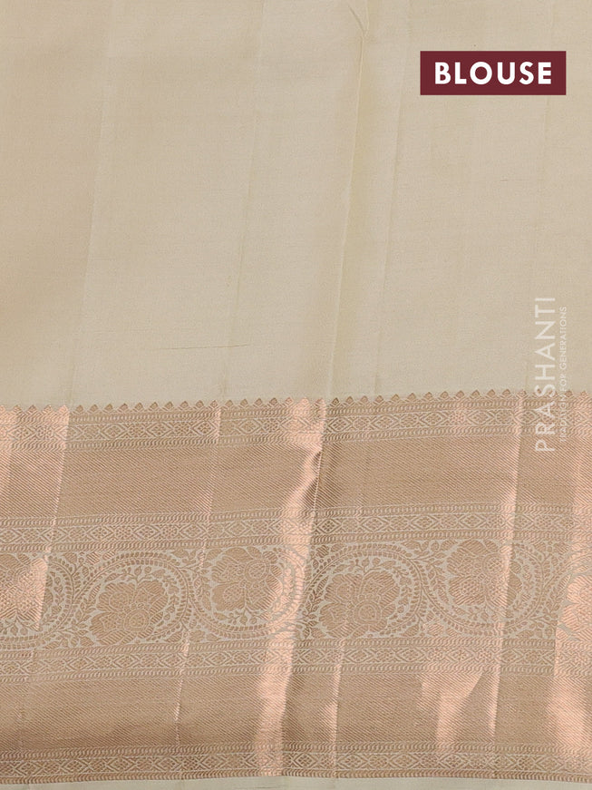Pure kanchipuram silk saree cream with allover silver & gold zari woven floral brocade weaves and rich copper zari woven border